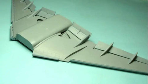 One Hundred Forty Four Scale Boeing 777 300 Landing Flaps Resin Aircraft Accessory Kit in grey, showing flap detail.