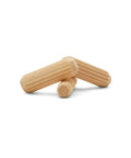 Three One Inch Long Fluted Dowel Pins One Quarter Inch Diameter for Woodworking Furniture and Crafts, close-up view.