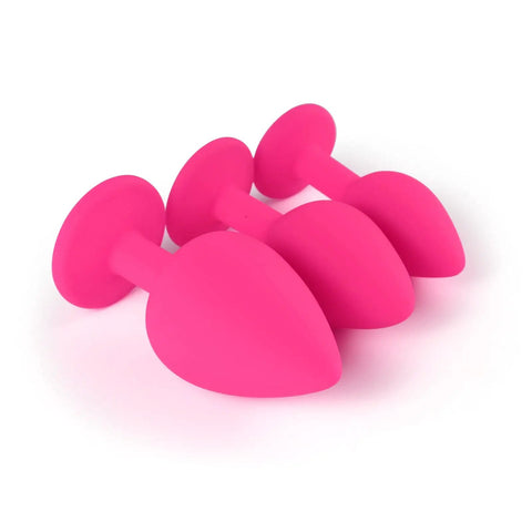 3 Piece Silicone Jeweled Anal Butt Plug Set With 3 Sizes Beginner Anal Trainer Kit For Men And Women, pink plugs in small, medium, large.
