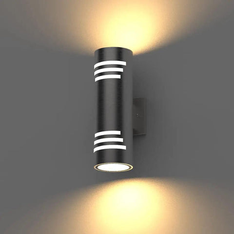 2 Pack Outdoor Wall Sconce Lights With Up And Down LED Cylinder Design, 304 stainless steel sconce on gray wall, illuminated uplight and downlight