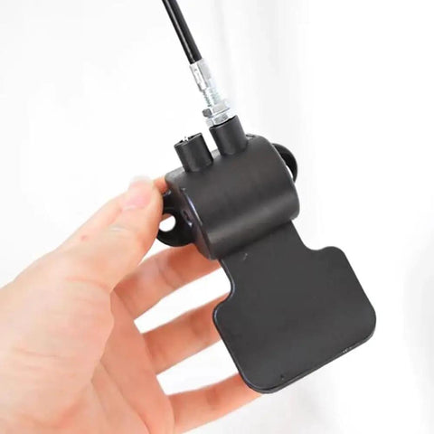 Heavy Duty Pneumatic Vertical Lifter With Wire Control Buttons and Adjustable Push Rod Lift Thickened Steel Construction close-up of control component in hand.