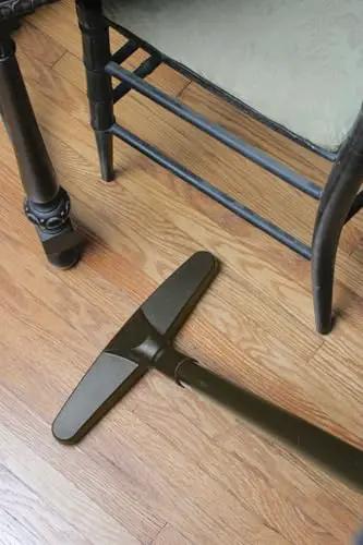 Upright and Canister Vacuum Extension Hose and Attachment Kit cleaning wood floor under chair