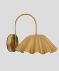 SHAHLUMES Handcrafted Curved Brass Flower Wall Sconce | Modern Bedside Wall Light with fluted shade in brass finish.