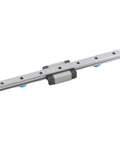 100mm linear rail guide with sliding carriage on a silver aluminum rail; gray carriage.
