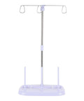 Top Tier 15 Bobbin Thread Stand For Sewing Machines, Purple thread organizer with durable polyethylene base and metal rods.