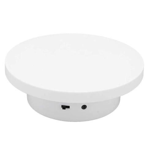 Super Cool Motorized Rotating Display Stand With Smooth 360 Degree Spinning Action Perfect For Showcasing Jewelry Watches And Cakes On Any USB Powered Setup With Solid 3KG Load Capacity - side view of white ABS turntable with USB port.