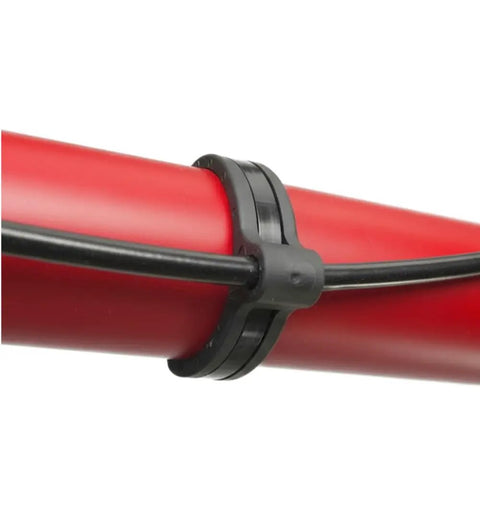 Outdoor UV Resistant Rubber Cable Zip Tie Mount Kit securing cable on red pipe, heavy duty black nylon mount for 3/8 to 1/2 inch cables.