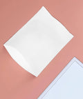 White EPE foam pouch on peach background, part of 100 Count White EPE Foam Packing Bags For Shipping And Moving Thick Tear Resistant Cushion