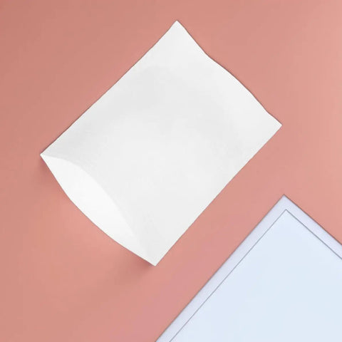 White EPE foam pouch on peach background, part of 100 Count White EPE Foam Packing Bags For Shipping And Moving Thick Tear Resistant Cushion