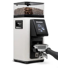 Heavy Duty Automatic Espresso Coffee Grinder White With Dual Programmable Dosing Rings Micro Burr Precision Plus Slick Touchscreen Panel For No Hassle Barista Level Brews Smooth Operation Verified, side view with coffee beans.