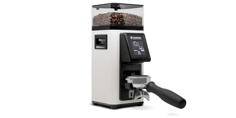 Heavy Duty Automatic Espresso Coffee Grinder White With Dual Programmable Dosing Rings Micro Burr Precision Plus Slick Touchscreen Panel For No Hassle Barista Level Brews Smooth Operation Verified, side view with coffee beans.
