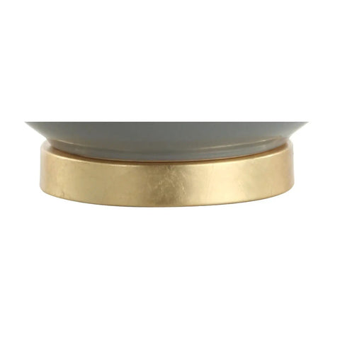 Close-up of the brass base of the 27 Inch Gray And Brass Ceramic Table Lamp For Living Room And Bedroom With White Linen Drum Shade Modern