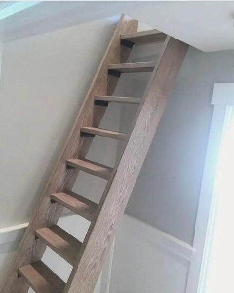 Kickass Water Based Wood Stain With A Slick Gray Brown Tint on a wooden staircase showing smooth weathered style.