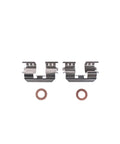 Two rear brake caliper bracket pieces with copper washers