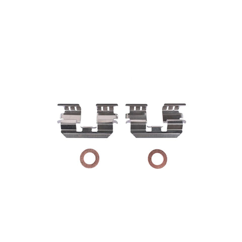 Two rear brake caliper bracket pieces with copper washers
