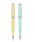 Yellow and mint acrylic fountain pens with 0.5mm nib for school and office use, smooth writing and comfortable grip, unisex design.