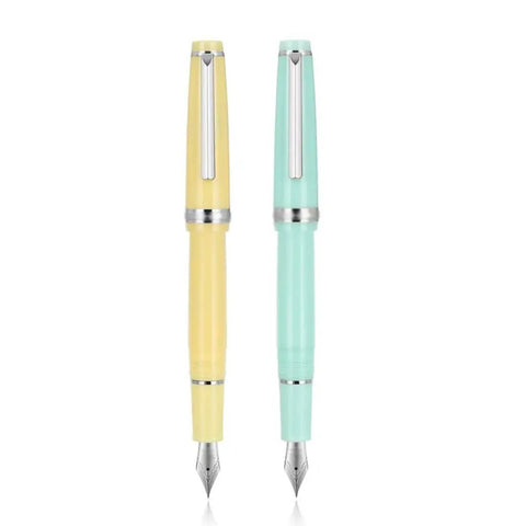 Yellow and mint acrylic fountain pens with 0.5mm nib for school and office use, smooth writing and comfortable grip, unisex design.