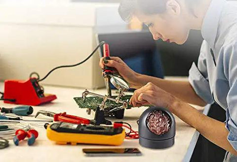 Person using Pro DIY Soldering Iron Kit Four In One With Brass Tip Cleaner That Works Without Water Point Six Millimeter Solder Wire Fifty Gram Rosin Flux Paste Ten Gram No Clean Core Solder Handy Welding Tool Set For Home Projects on electronics at a workbench.