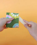 Person using Two Point Turner Sewing Tool With Dual Points And Spatula End For Tight Corners And Seams on fabric, Clover Needlecraft