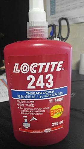 Red bottle of Loctite 243 medium-strength threadlocker with product information, 250 mL, on a table.