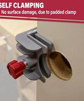 Lock Mate Plus Self Clamping Professional Door Lock Installation Kit on wood door showing jig and hole saw in place.