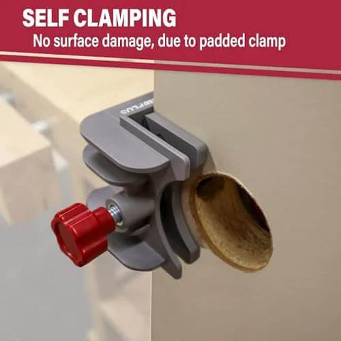 Lock Mate Plus Self Clamping Professional Door Lock Installation Kit on wood door showing jig and hole saw in place.