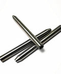 Angled view of three metal water jet nozzle focusing tubes for abrasive cutting, 76.2 mm length.