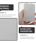 Hand holding 10 Piece Microwave Oven Mica Insulation Sheet, heat-resistant waveguide cover, close-up view