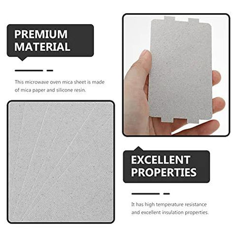 Hand holding 10 Piece Microwave Oven Mica Insulation Sheet, heat-resistant waveguide cover, close-up view