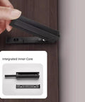 Close-up of a hand holding a 4 Pack Magnetic Push Latch Kit for Hidden Cabinets and Drawers, Push To Open Doors, white finish, core view