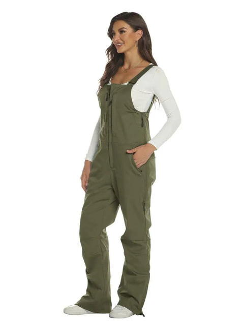 Woman wearing Women's Insulated Waterproof Snow Bibs For Skiing And Winter Outdoor Adventures, durable windproof snow pants overalls