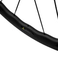 Close-up of Carbon Wheelset 45to50CU-25-CC 700C Tubeless Rim Brake For Road Bikes, showcasing a detailed carbon rim with spokes.