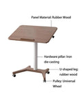 No Drama Roll Mobile Standing Desk featuring smooth gas lift adjustments, rubber wood top, and universal wheels for portability.