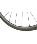 Close-up of the Carbon Fiber 38mm 700c Disc Brake Road Bike Wheelset Clincher Tubeless Ready with MT075 Hub 24 Hole Spokes