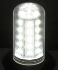 Bright LED bulb with clear protective casing, illuminated on a dark background, showcasing modern energy-efficient lighting.
