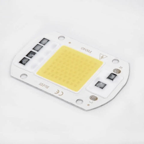 LED COB Chip Floodlight Bulb 20W 30W 50W 220V Input High close-up view of COB chip on white board.