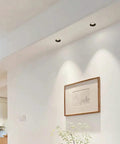 Top Shelf Slick Led Mini Downlights 5W Recessed Can Ceiling Fixtures Deep Antiglare Cob Core lighting mounted on a wall.