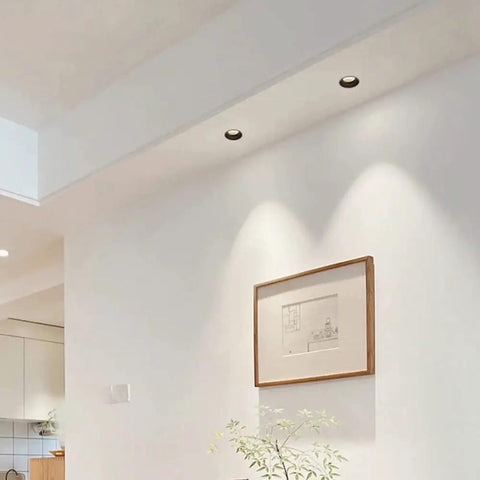 Top Notch Mini LED Downlights Recessed Lighting With Heavy Duty Aluminum Build And Zero Glare Vibes CRI 95 Plus For Crisp Even Spread Super Quick Snap Fit Setup Five Pack Daylight White installed in a modern living space.