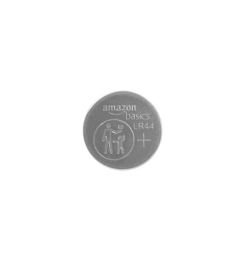 Close-up of a single LR44 alkaline button cell battery labeled by Amazon Basics, designed for reliable 1.5 volt power.