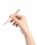 Hand holding one pencil from Short Wood Golf Pencils Set Of 60 With HB Graphite Core And White Erasers For Kids Beginners Classroom And Home Art Projects Writing And Drawing Tools Kid Friendly