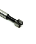 Carbon Steel Forstner Drill Bit For Woodworking Delivers Dead Nuts Accurate Cuts And Splinter Free Holes On Hard Wood MDF Plywood, close-up view.