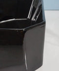 Close-up of USZWBY Vessel Sinks Bathroom Vessel Sink with Faucet Hole ceramic wash basin in glossy black finish.