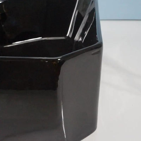 Close-up of USZWBY Vessel Sinks Bathroom Vessel Sink with Faucet Hole ceramic wash basin in glossy black finish.