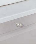 Smooth And Stylish Satin Nickel Mushroom Cabinet Knobs For No Sweat Hardware Swaps And Instant Kitchen Glow Ups That Fit Perfectly On Drawers Cupboards And Desk Surfaces on a white drawer.