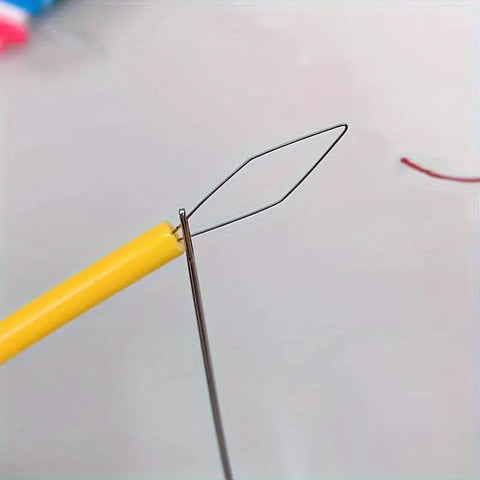 Close-up of 5 Piece Needle Threading Tool Set For Sewing Beading And Crafting Easy Threading Guides To Help Thread Through Needle Eyes
