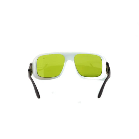Top Shelf Infrared Laser Safety Glasses For Nd Yag And Diode Cutters Defending 740 To 1100nm Ranges With Badass OD Ratings Up To Seven front view with clear frame and yellow-green lenses.
