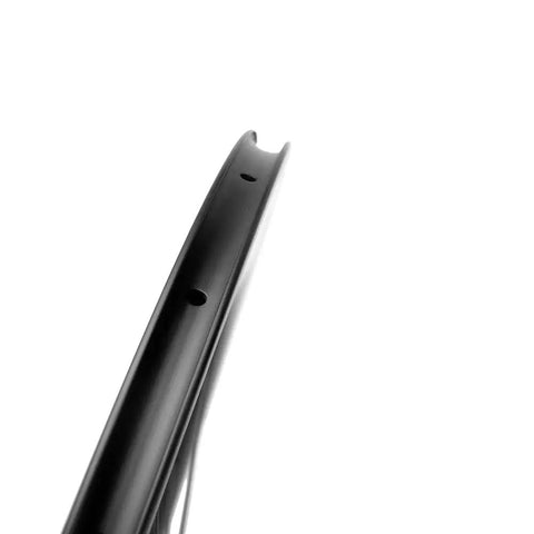 Side view of Fixed Gear 700C Carbon Fiber Clincher Wheel, 88mm Rear Only, showing aerodynamic design and holes for spokes.