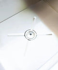 Bottom drain of Pro-Level 23X17 Drop-In Stainless Steel Ice Chest With Rock-Solid Dual-Wall Insulation.