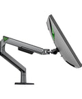 Heavy Duty Adjustable Monitor Mount angled view showcasing ergonomic support for efficient desk use. Boost Your Desk Game With This Heavy Duty Adjustable Monitor Mount And Rugged Desk Clamp That Holds Firm Without Any Sweat While Offering Slick Ergonomic Screen Support.