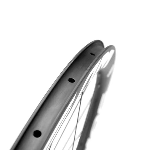 Detail of High-Performance 50mm Carbon Fiber Disc Brake Wheelset For Road Bikes, 700c Clincher With UD Matte Finish, hole pattern visible